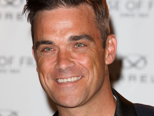 Robbie Williams le dedica canción a sus hijos