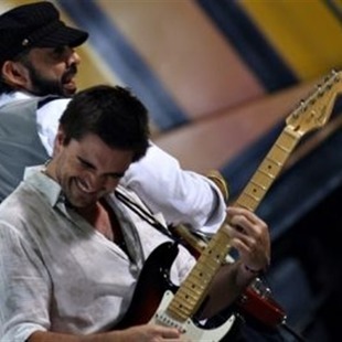 Juan Luis Guerra y Juanes dan concierto benéfico