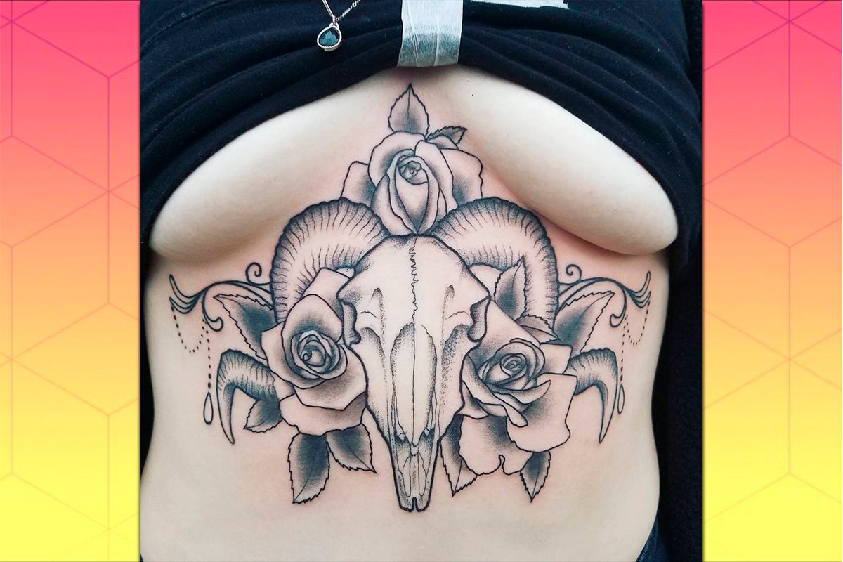 Colored under boob tattoo